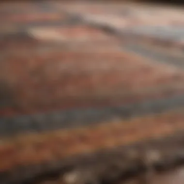 Signs of wear on a woven rug surface