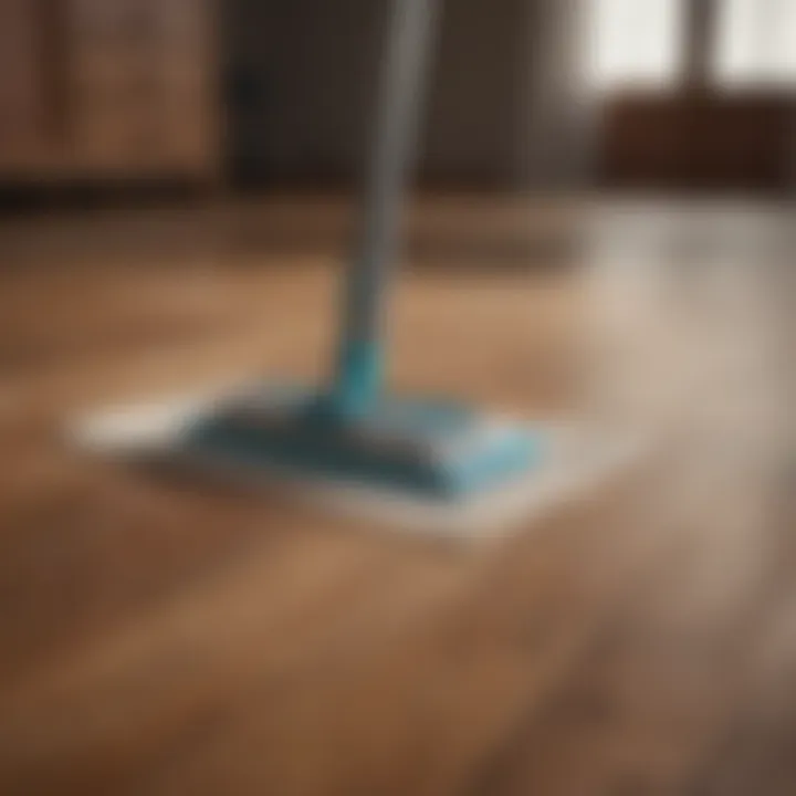 A wooden floor being cleaned with a cloth