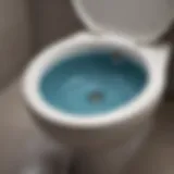 Close-up of a clogged toilet bowl filled with water