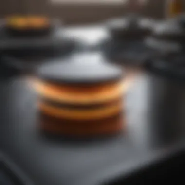 A close-up view of an electric cooktop being cleaned