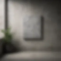 Hanging artwork on a textured concrete wall