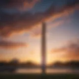 A panoramic view of the Washington Monument at sunset, showcasing its iconic structure against a colorful sky.