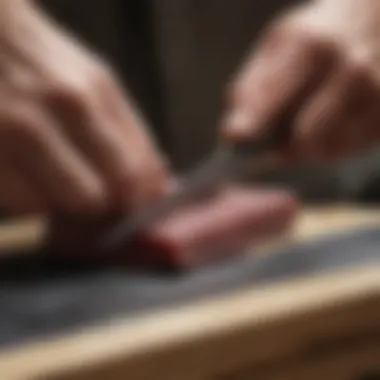 Mastering the Technique of Knife Sharpening Close-up of a knife being sharpened on a whetstone