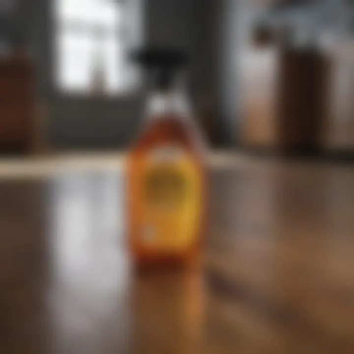 Vinegar solution in a spray bottle ready for cleaning hardwood floors