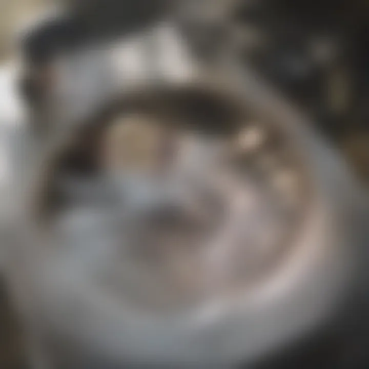 Professional plumber addressing a clogged sink